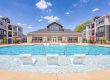 Corporate apartment community in North Carolina with swimming pool and fitness center.