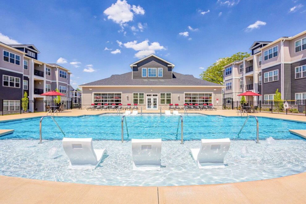Corporate apartment community in North Carolina with swimming pool and fitness center.